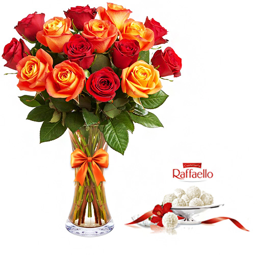 "Огненное сердце". Букет роз и конфеты Raffaello